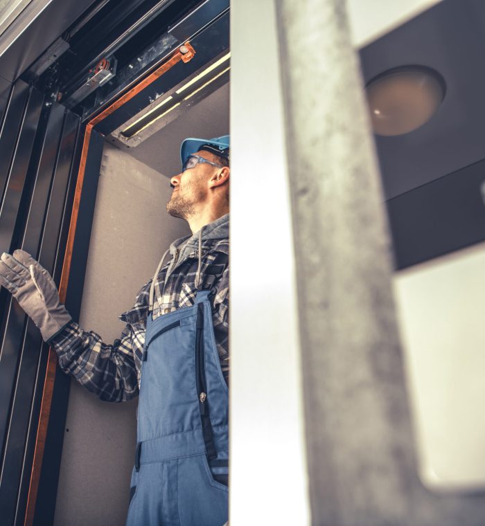New Residential Building Elevator Installation New Residential Building Elevator Installation. Final Checks Performed by Professional Elevator Systems Technician in His 40s.